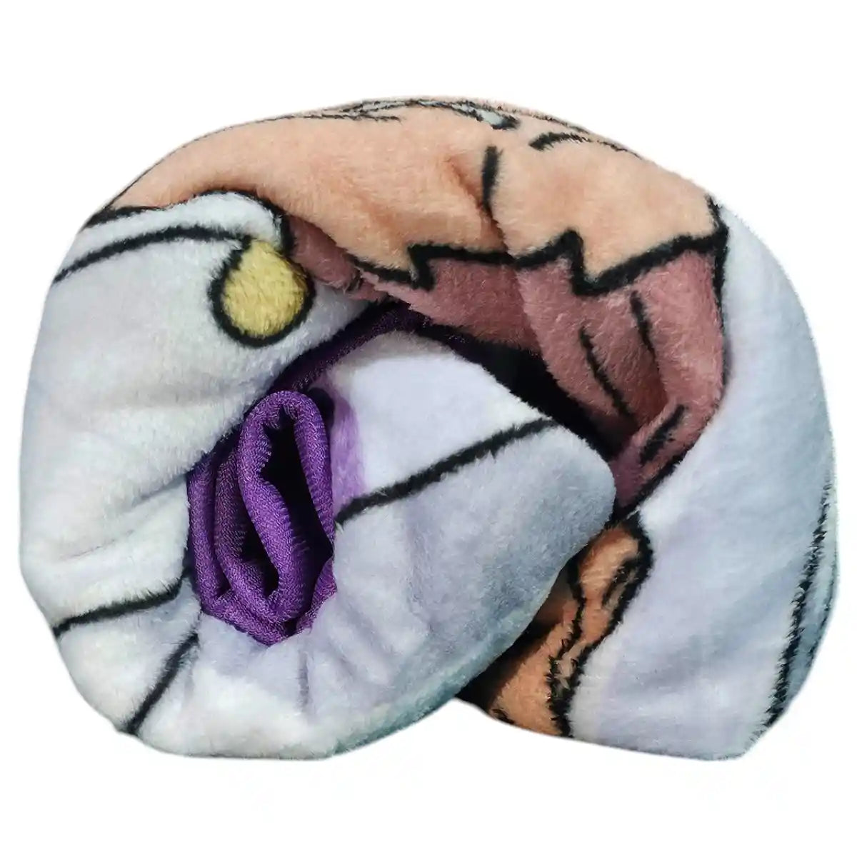 Manta polar de Luffy Gear 5 enrollada mostrando textura suave y diseño
